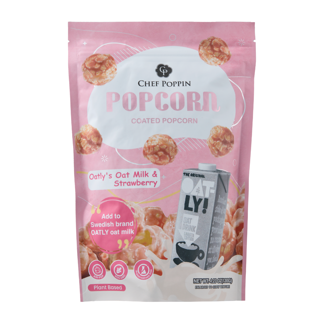 Chef Poppin popcorn package with Oatly milk carton on a pink background